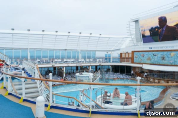 Ruby Princess Royal Voyage 11 Ruby Princess interior corridor with tasteful lighting and decor.