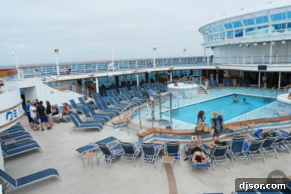 Ruby Princess Royal Voyage 9 Stylish seating area within the Ruby Princess, perfect for relaxing with a view.