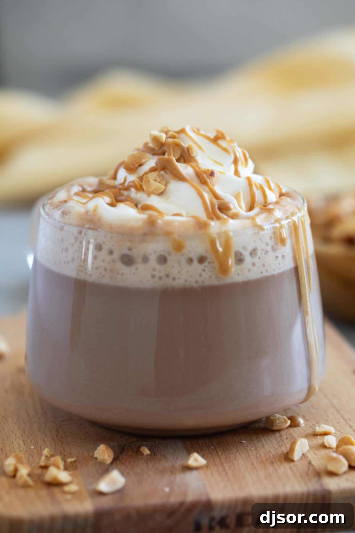 Peanut Butter Chocolate Bliss 6 Peanut Butter Hot Chocolate topped with peanut butter and peanuts.