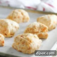Chipotle Cheddar Scones on a baking sheet.