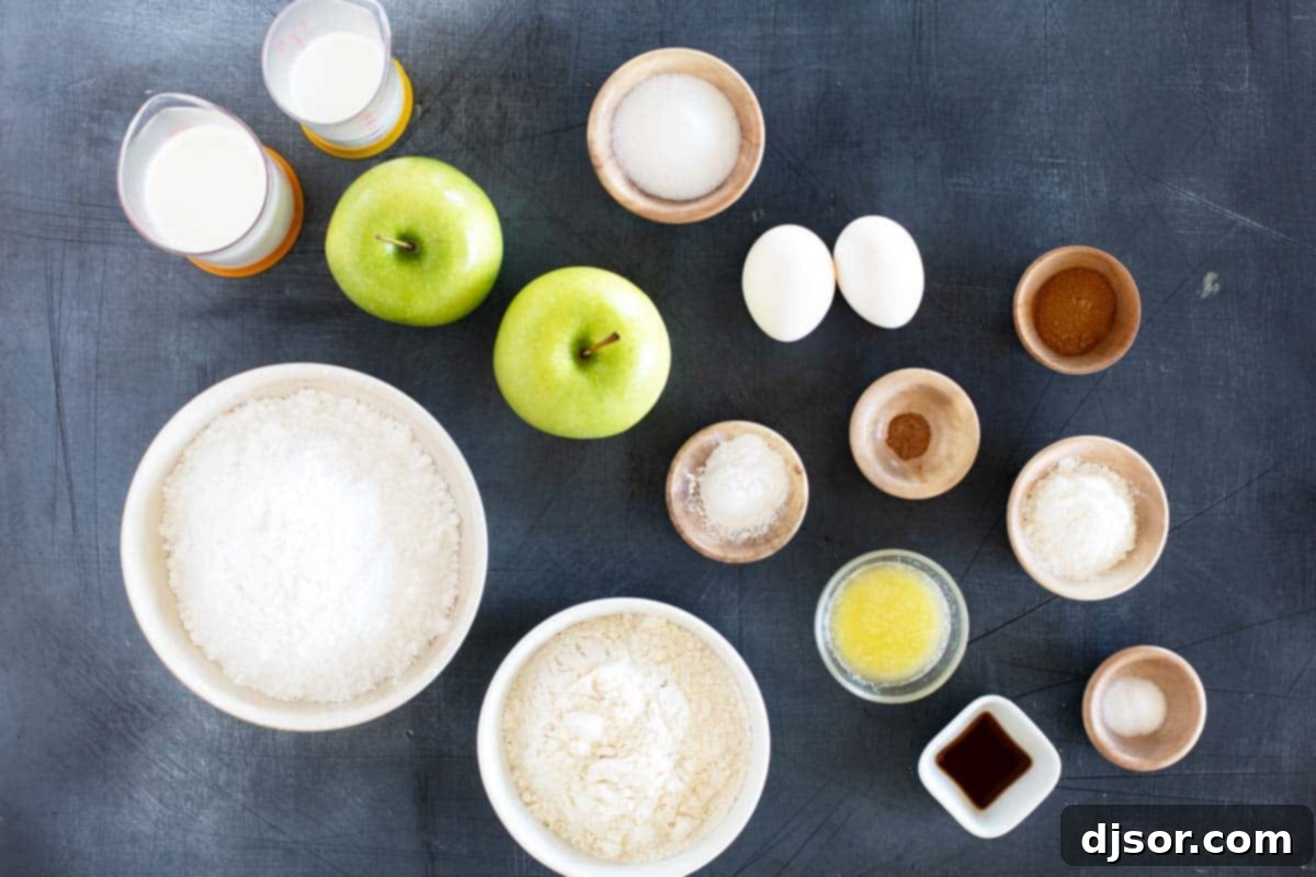 Golden Apple Delights 3 A selection of fresh ingredients including apples, flour, sugar, and spices, laid out for making apple fritters.