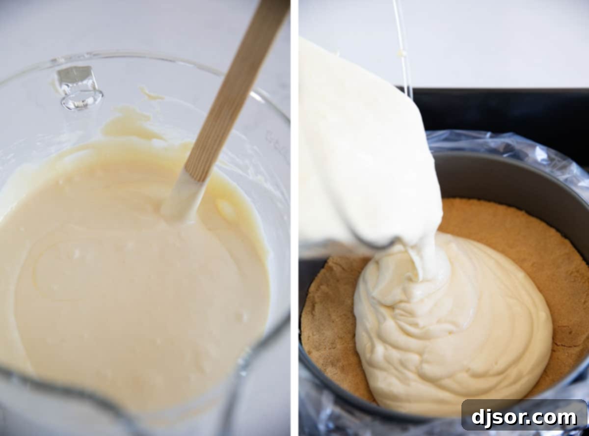 Smooth cheesecake batter being poured into a springform pan with a cookie crust, ready for baking.