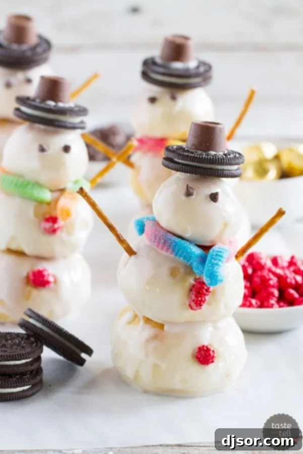 Sunset Snowman's Odyssey 2 Delicious Orange Snowman Rolls, glazed and decorated for a festive winter treat