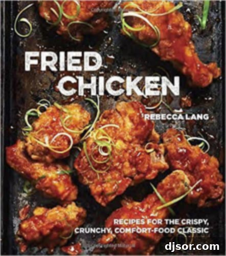 A review of the 'Fried Chicken' cookbook by Rebecca Lang, highlighting a recipe for Honey Fried Chicken served with Hot Honey Sauce and Biscuits.