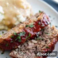 sliced meatloaf with mashed potatoes