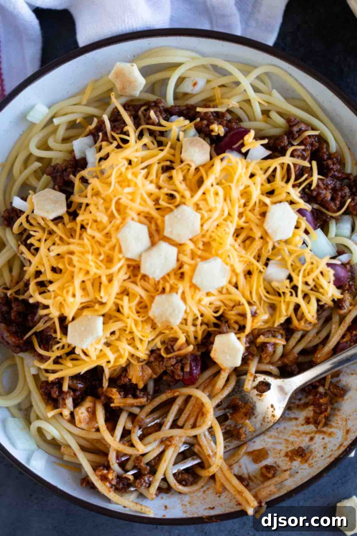 Cincinnati Chili The Five Way Wonder 9 Spaghetti topped with Cincinnati Chili, beans, onions, and cheese.
