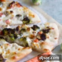 Roasted Vegetable Pizza with Ranch, featuring a medley of fresh, roasted vegetables.
