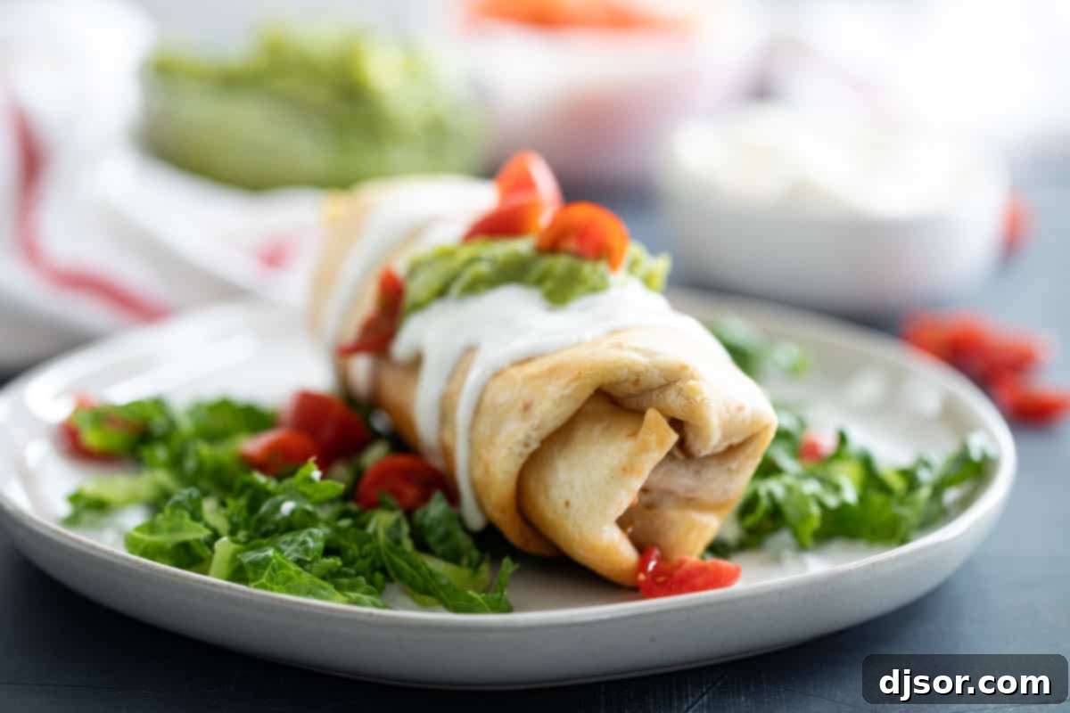 Golden, crispy Chicken Chimichanga on a plate, ready to be enjoyed