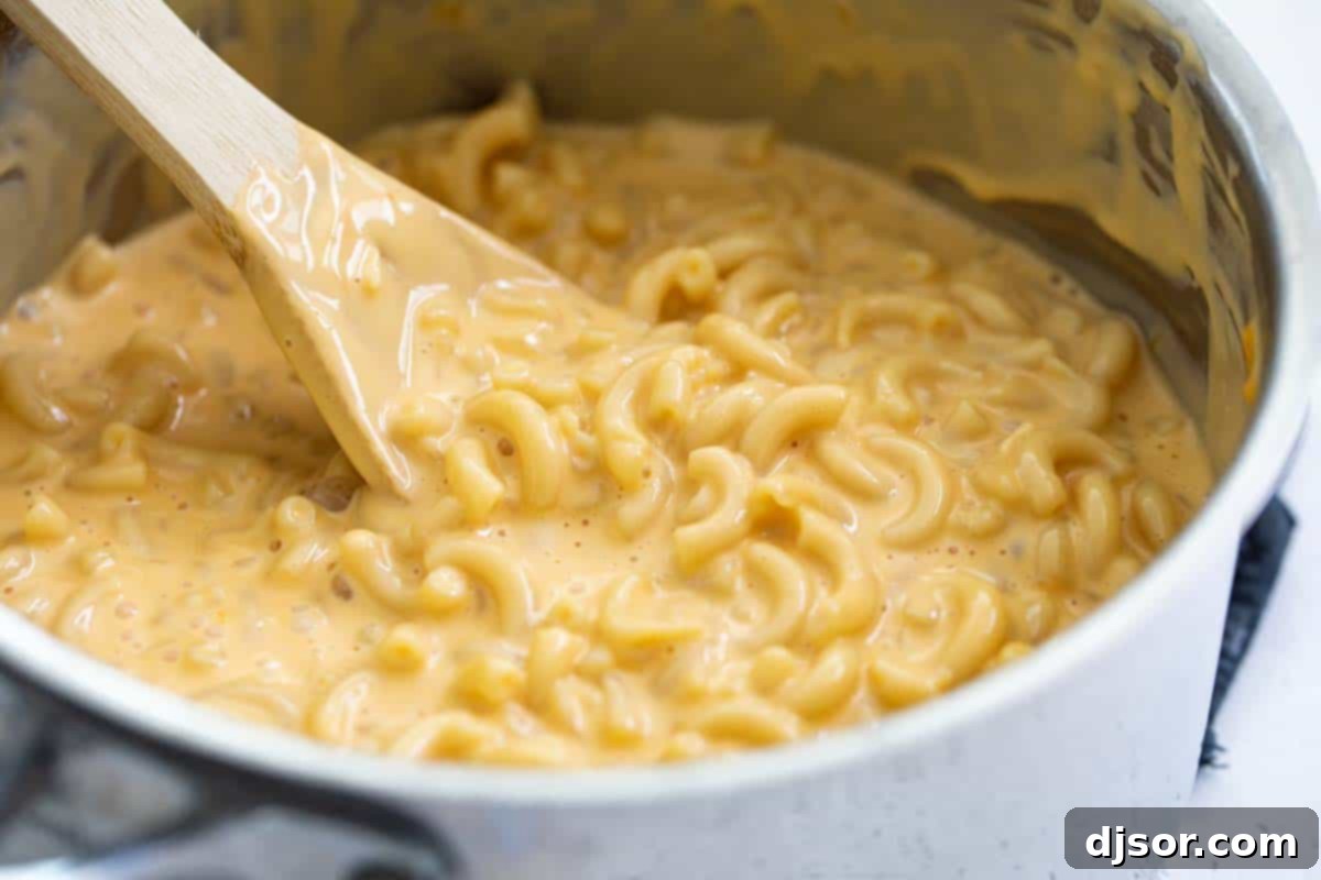 Pot of creamy, homemade Mac and Cheese, rich and golden