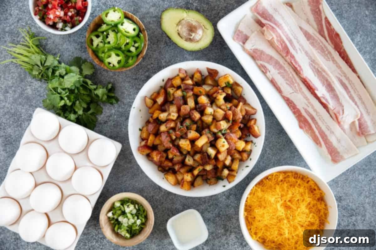 Various fresh ingredients laid out for making a homemade Breakfast Bowl, including eggs, bacon, potatoes, and toppings.