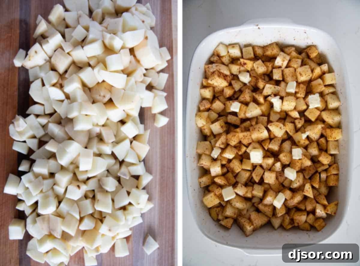 Cubing potatoes and tossing them with spices in a baking dish