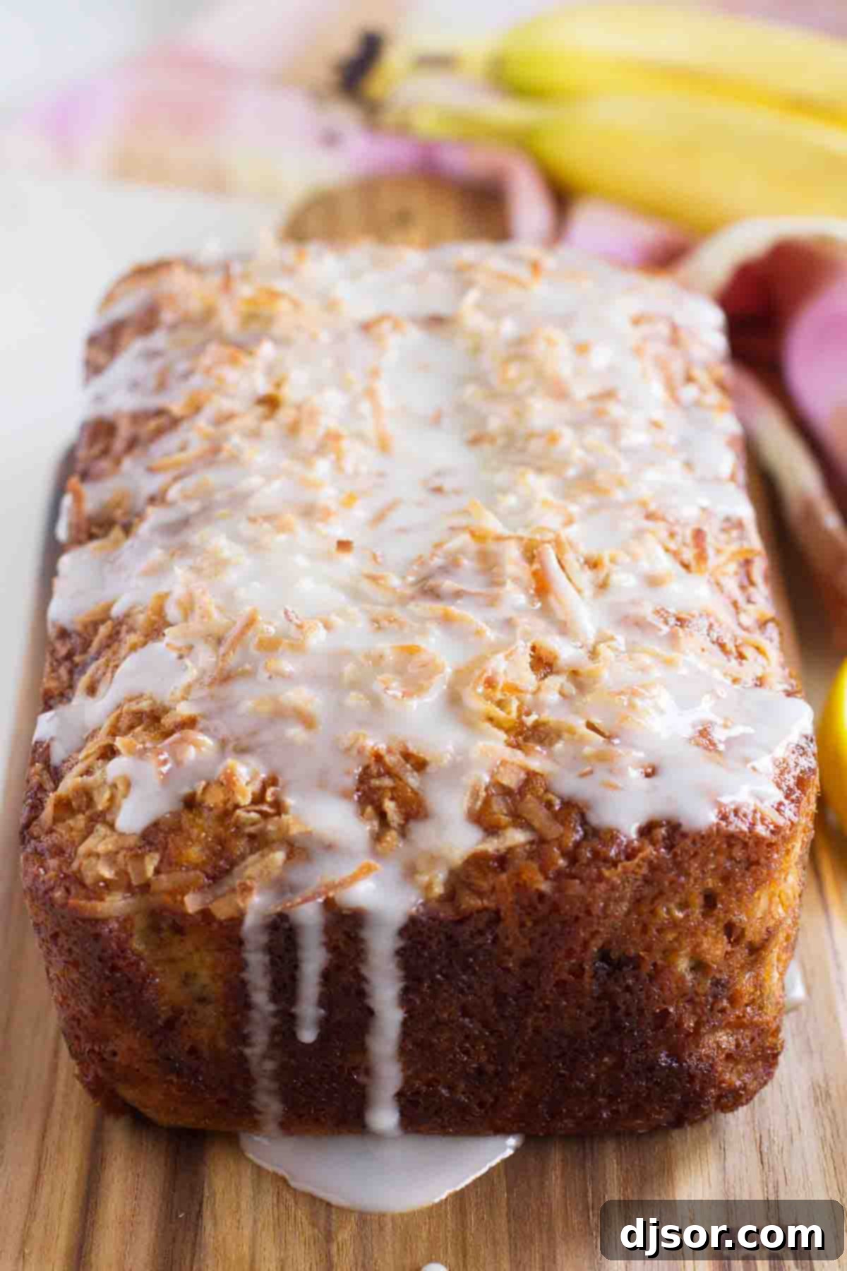 loaf of Citrus Glazed Coconut Banana Bread