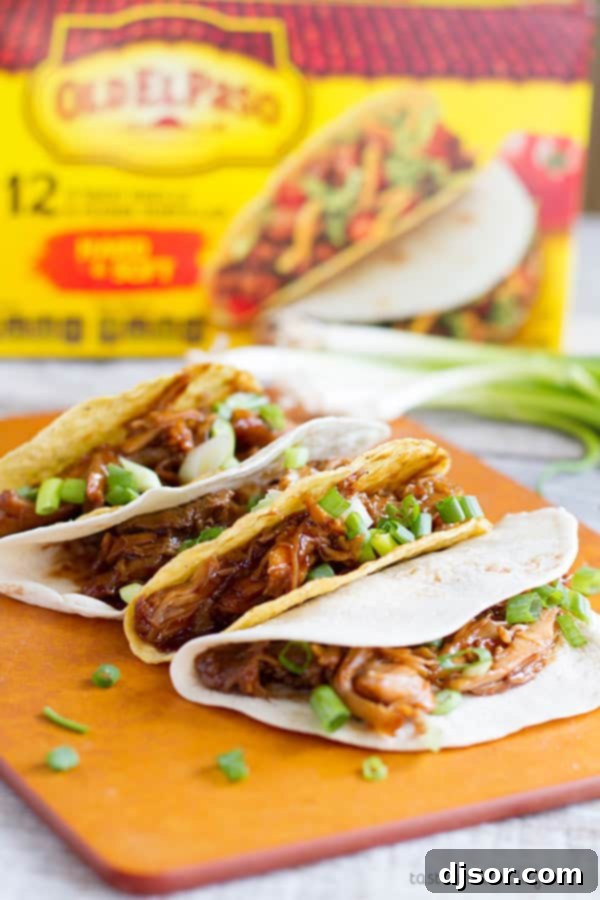 Upgrade Your Taco Night: 22 Irresistible Taco Recipes 17 Honey Garlic Chicken Tacos - Chicken thighs are slow cooked in a honey, soy and garlic mixture, then shredded for a fun Taco Tuesday.