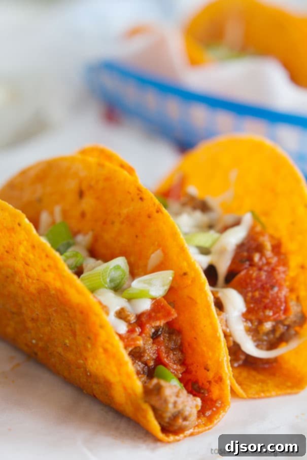 Upgrade Your Taco Night: 22 Irresistible Taco Recipes 15 Meat Lovers Pizza Tacos - Cheesy taco shells are filled with a meaty mixture of ground beef, sausage and pepperoni with pizza sauce in these tacos that are perfect for Meat Lovers Pizza lovers.