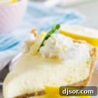 slice of lemon cream pie topped with whipped cream