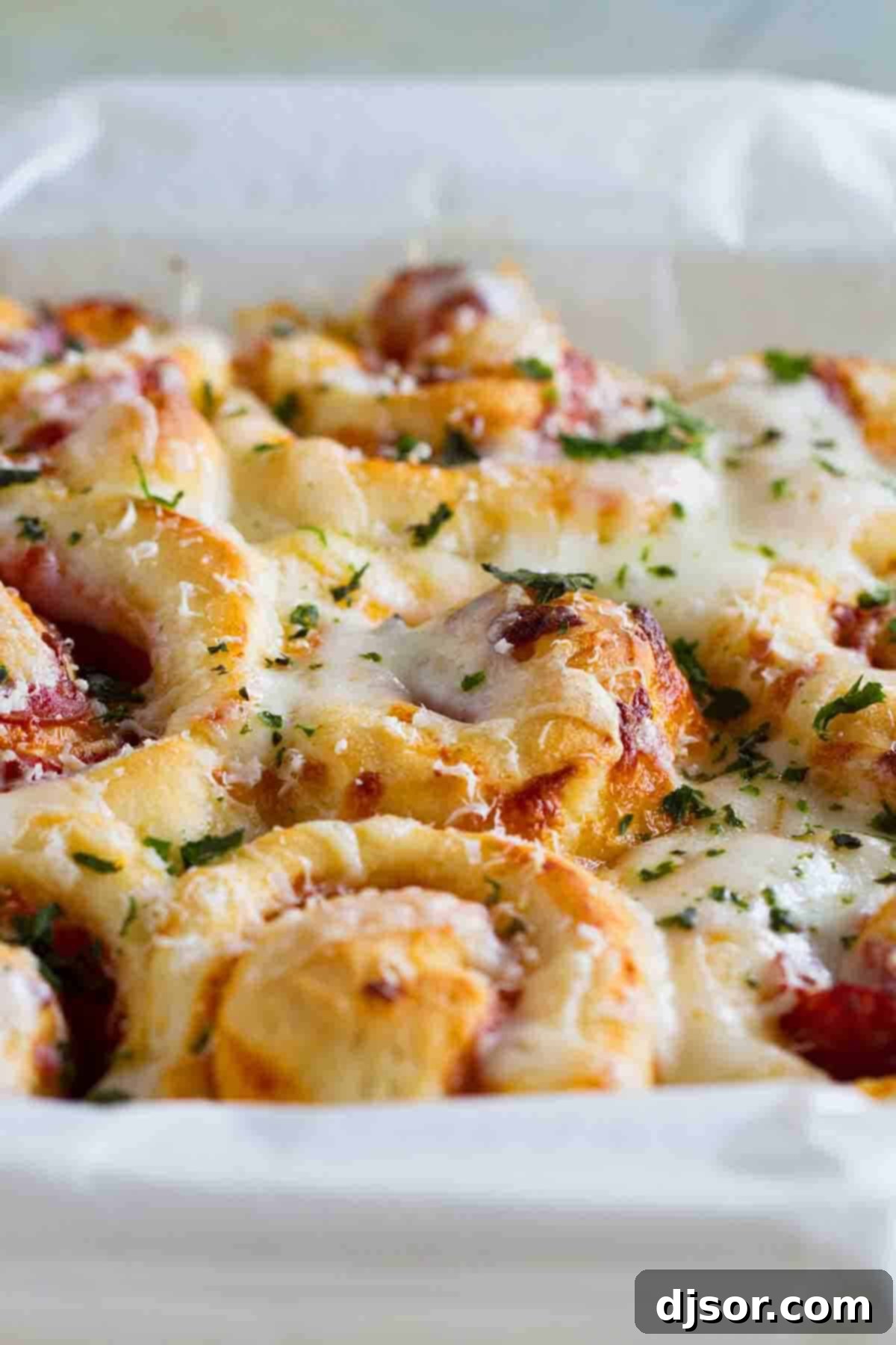 Homemade pizza rolls in a baking dish, perfectly golden brown and ready to serve.