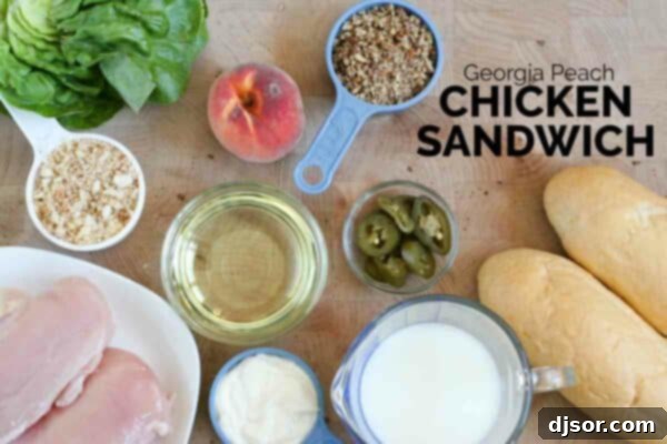 Golden Georgia Peach Chicken Sandwich 3 A close-up of all the fresh ingredients laid out, ready to make Peach Chicken Sandwiches, including chicken, peaches, and jalapenos.