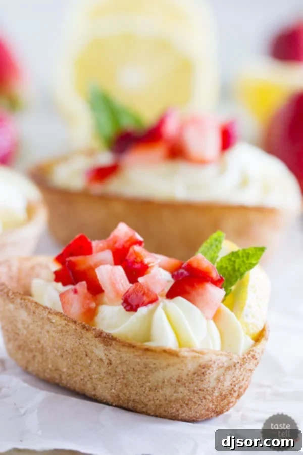 Light and lemony, these Lemon Cream Taco Boats have cinnamon-sugar coated tortilla boats filled with a creamy, luscious lemon cream. Top them off with diced strawberries for a perfect summer treat.