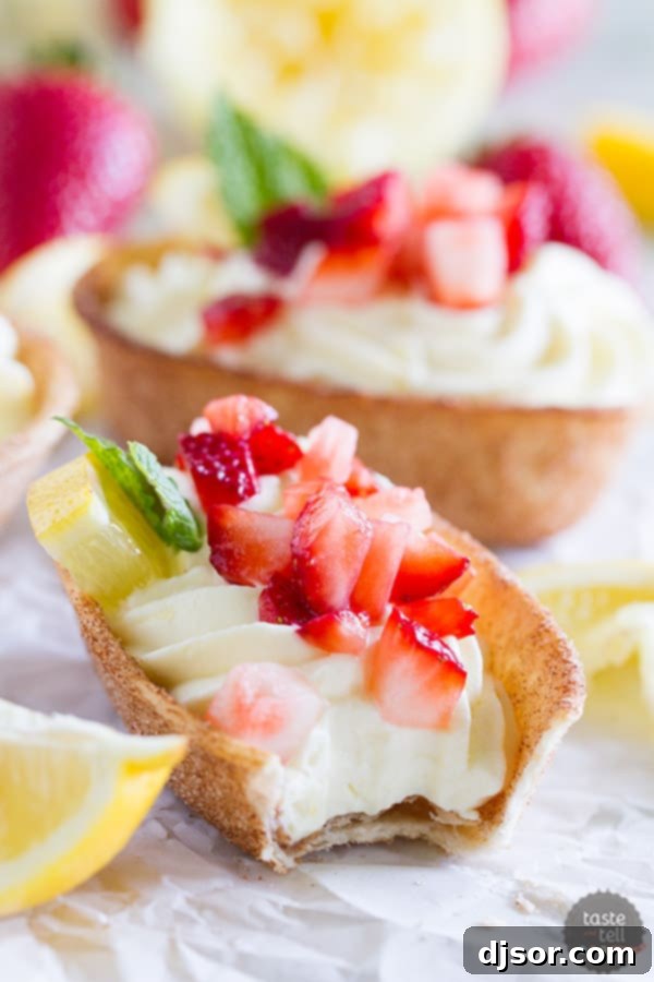 Light and lemony, these Lemon Cream Taco Boats have cinnamon-sugar coated tortilla boats filled with a creamy, luscious lemon cream. Top them off with diced strawberries for a perfect summer treat.
