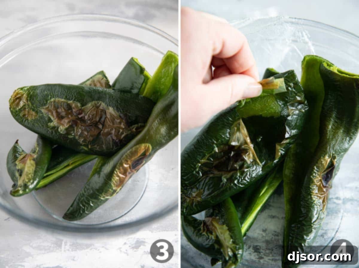 Zesty Green Pozole 5 Close-up of blistered and charred poblano peppers on a baking sheet after broiling, ready for peeling.
