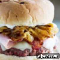 Triple Threat Pork Burger 6 Triple Pork Burger - made with ground pork and topped with ham, bacon, and caramelized onions.