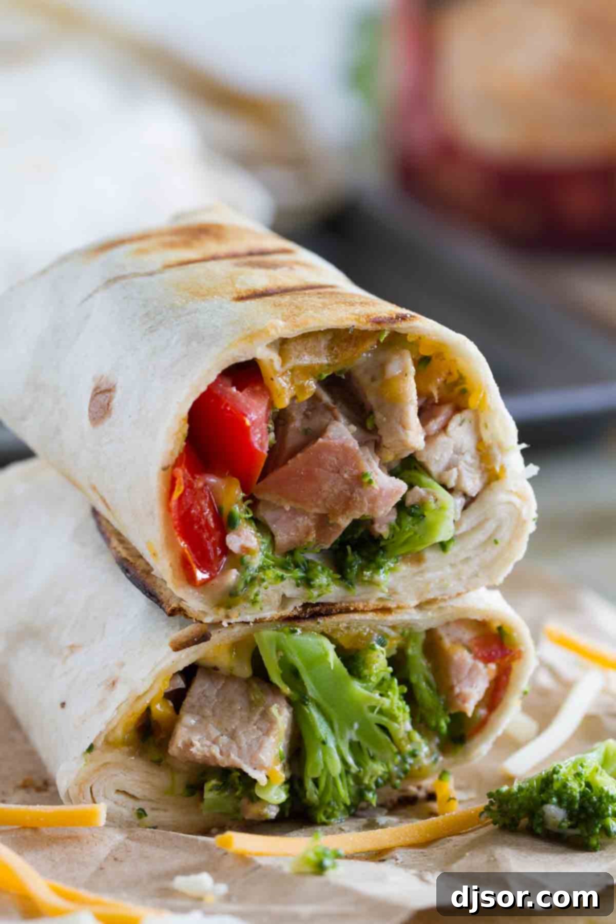 Grilled Pork Burritos cut in half and stacked, showcasing the delicious filling