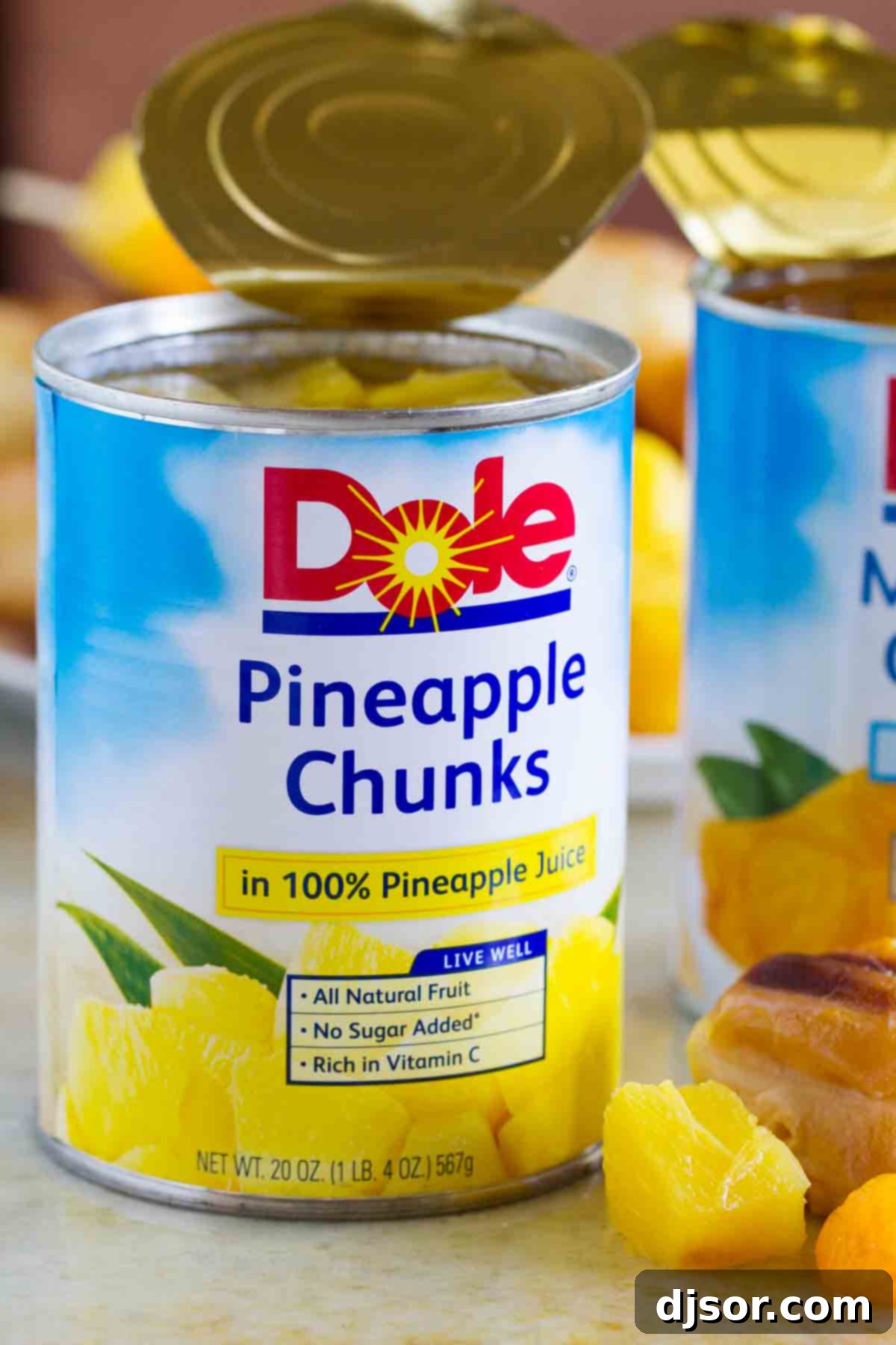 Dole Pineapple Chunks: A Pantry Essential A close-up shot of a single can of Dole Pineapple Chunks, highlighting the brand's commitment to quality and convenience for home cooks.
