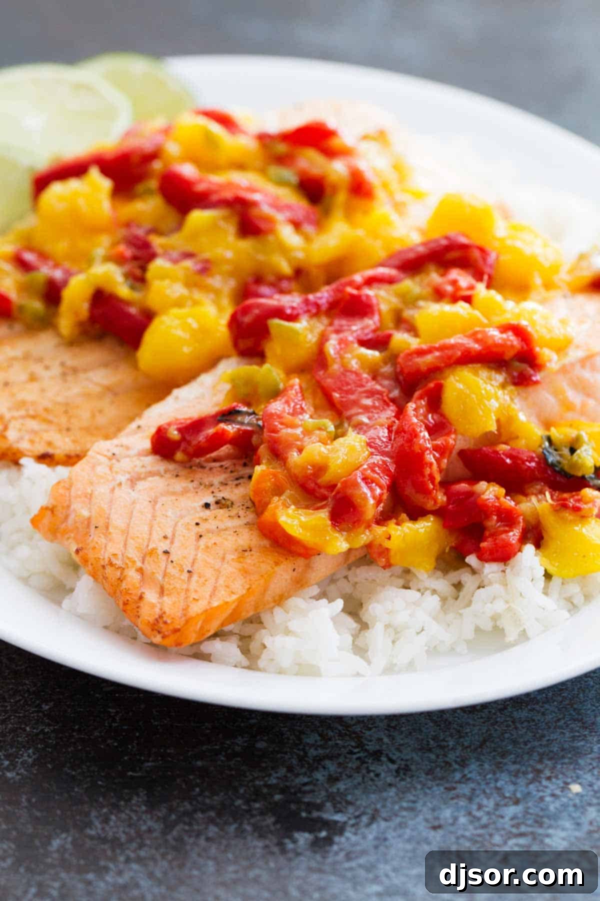 Salmon with Mango and Roasted Red Pepper: A vibrant, healthy dinner featuring flaky salmon topped with a sweet and savory salsa.