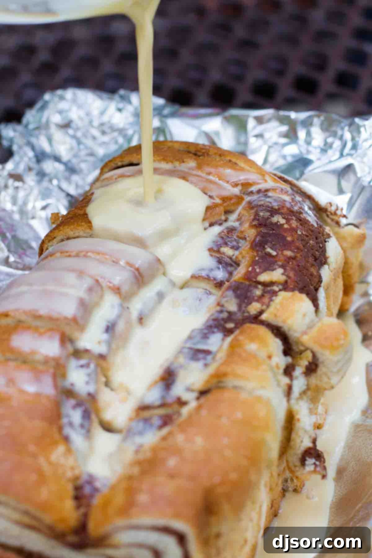 pouring custard mixture over campfire cinnamon bread