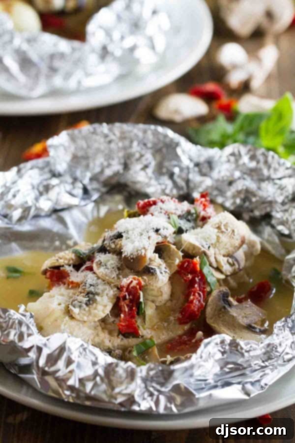 Healthy and fast, this Chicken Milano Foil Packet Recipe is great for a weeknight. The chicken is moist and flavorful, and clean up is a breeze!