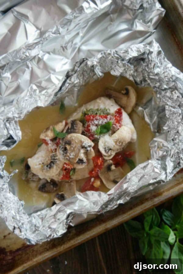 Healthy and fast, this Chicken Milano Foil Packet Recipe is great for a weeknight. The chicken is moist and flavorful, and clean up is a breeze!