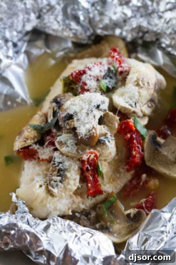 Healthy and fast, this Chicken Milano Foil Packet Recipe is great for a weeknight. The chicken is moist and flavorful, and clean up is a breeze!