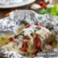 Healthy and fast, this Chicken Milano Foil Packet Recipe is great for a weeknight. The chicken is moist and flavorful, and clean up is a breeze!