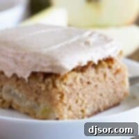 close up shot of slice of apple cinnamon sheet cake