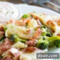 Savory Ham and Broccoli Pierogies 2 Pierogi recipe with ham and broccoli served with dipping sauce.