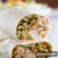 Sticky Honey Sesame Chicken Wraps 5 Honey sesame chicken salad wrap cut in half and stacked.