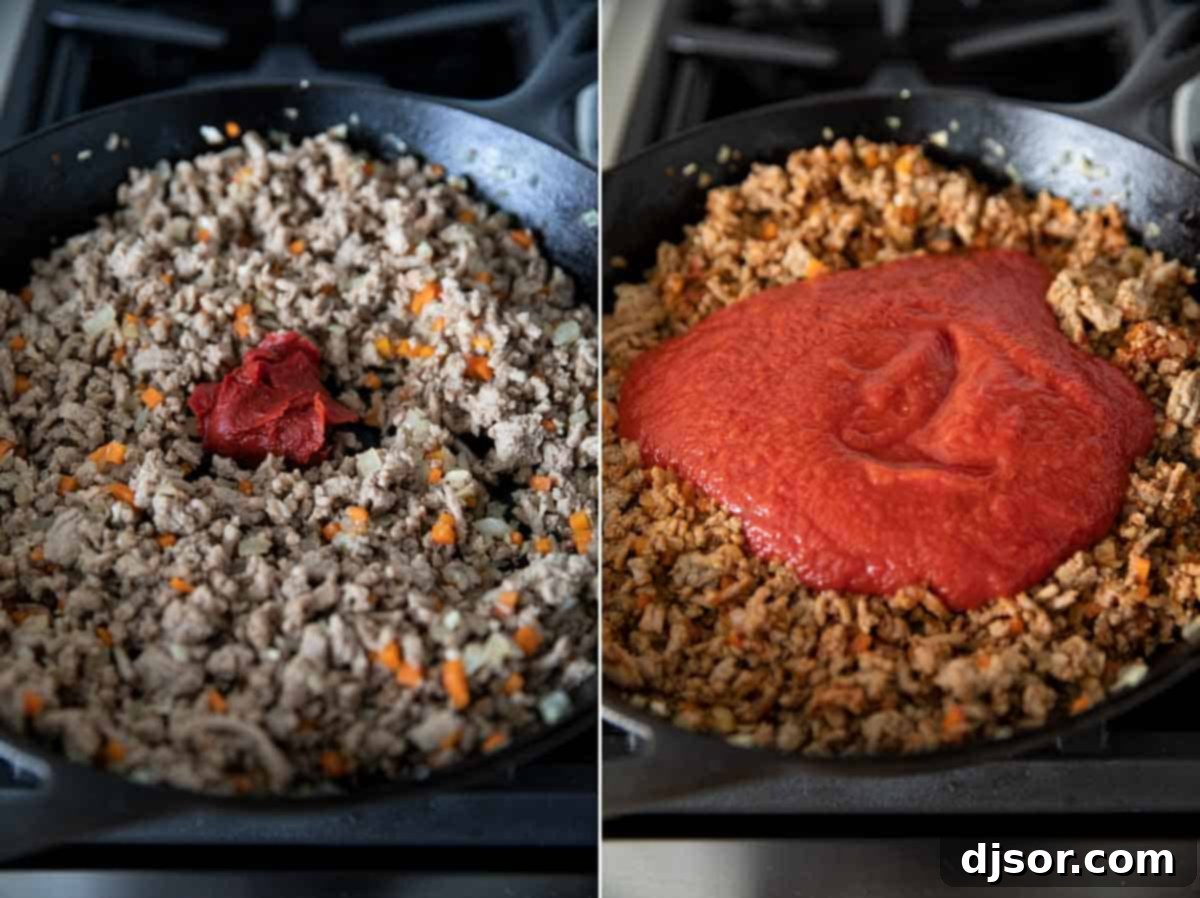 Crafting the Sauce: Incorporating Tomato Paste and Sauce into Turkey Sloppy Joes Tomato paste and tomato sauce being stirred into the cooked ground turkey and vegetable mixture in a cast iron skillet, creating the rich, saucy base for homemade sloppy joes.