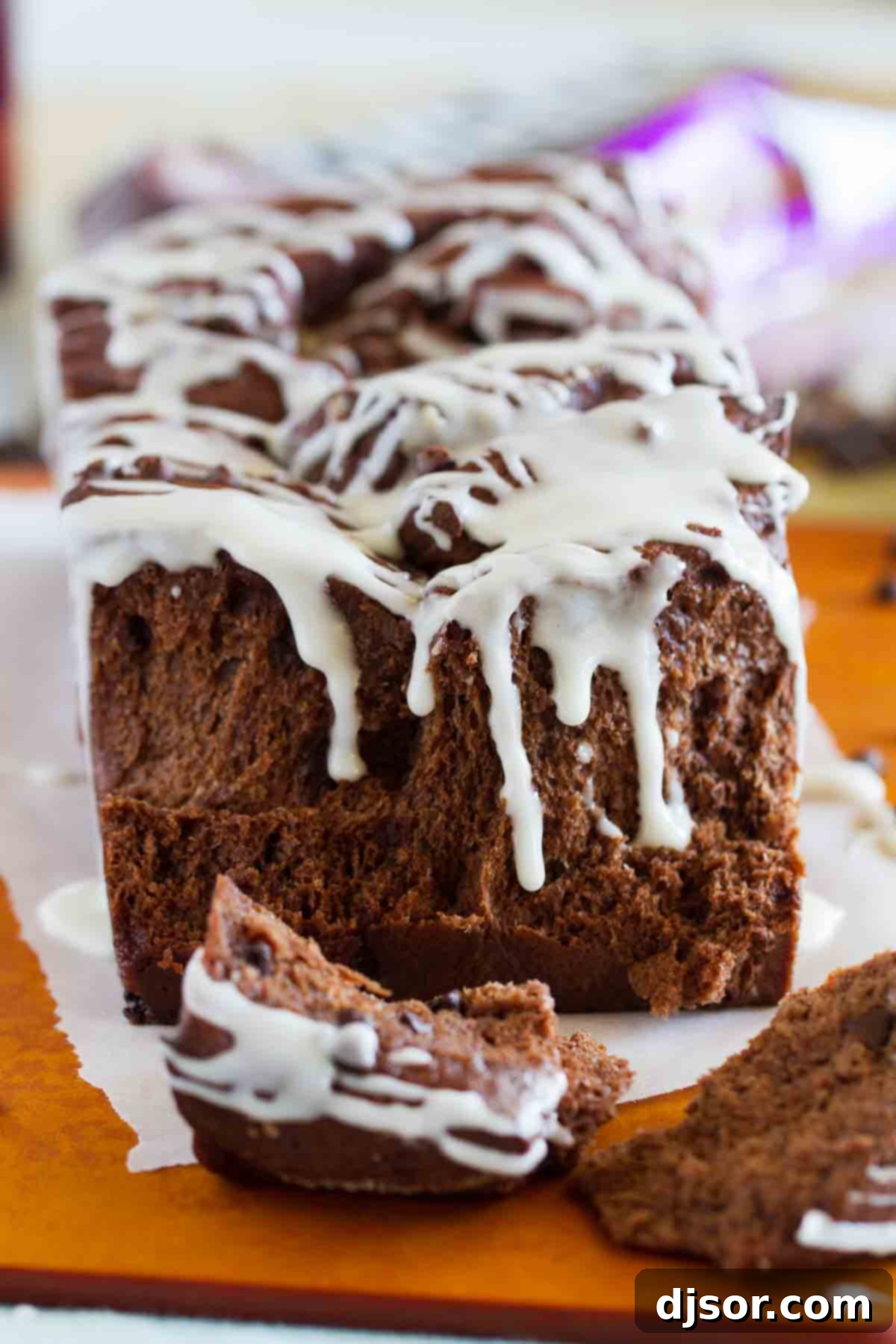 Decadent Chocolate Pull-Apart Loaf 6 Close-up of chocolate pull apart bread with several pieces already pulled off, showing the layered texture