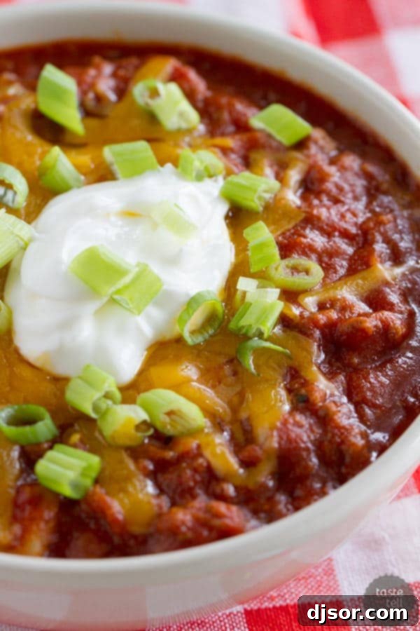 A large pot filled with Flatlander Chili, ready to be served, showcasing its rich texture and ingredients.
