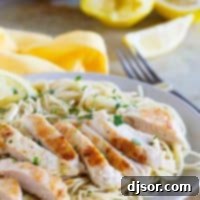 Lemon Chicken Pasta on a plate topped with parsley