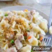 The flavors of chicken pot pie - in pasta form! This Chicken Pot Pie Ragu combines a creamy chicken gravy with pasta for a comforting, warming dinner.