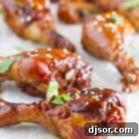 Sticky Sweet Chili Slow Cooker Drumsticks 2 Slow Cooker Sweet Chili Chicken Drumsticks sprinkled with sesame seeds