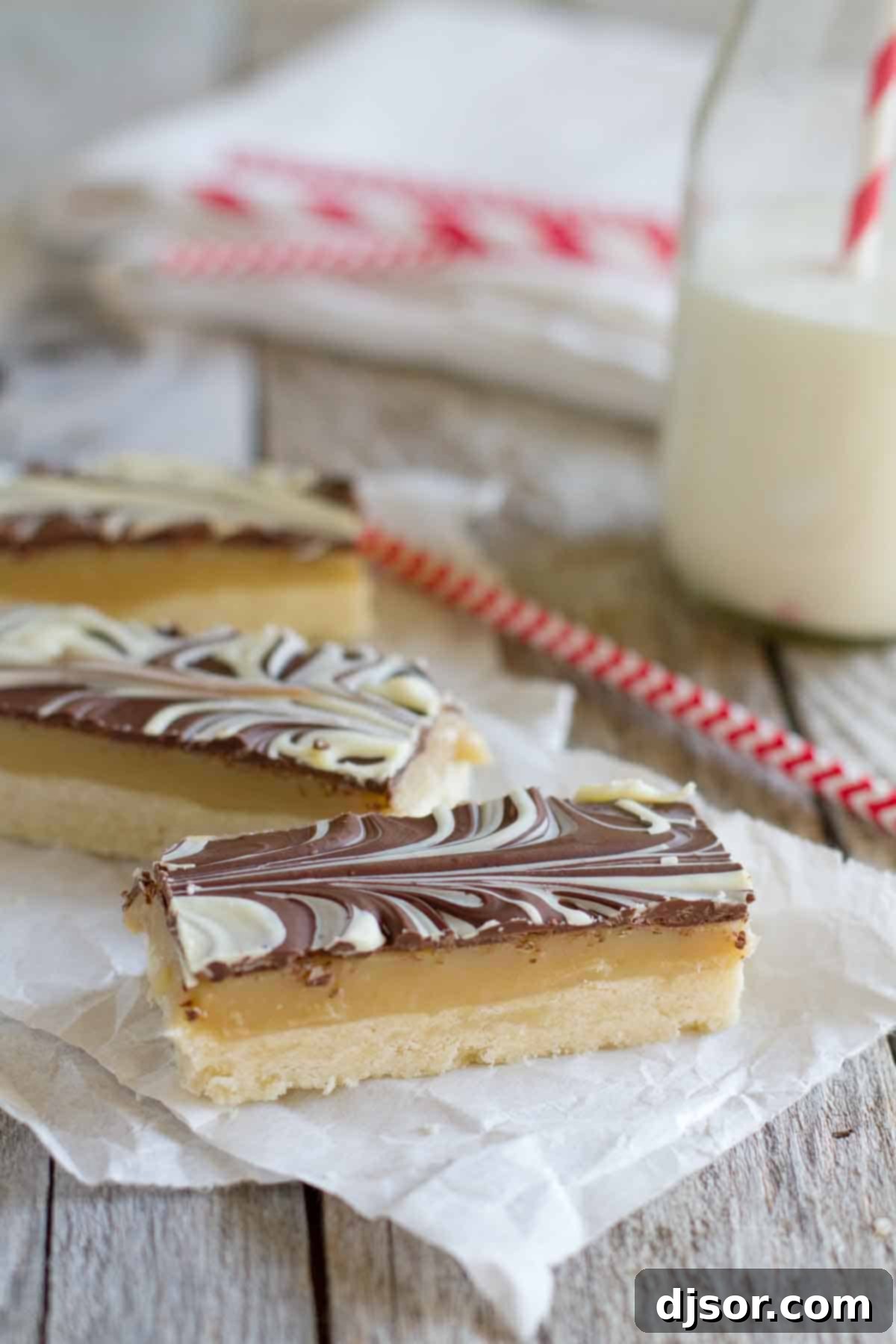 Marbled Caramel Chocolate Slice on paper, showcasing its elegant layers and marbling.