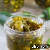 Candied Jalapeños in a jar.