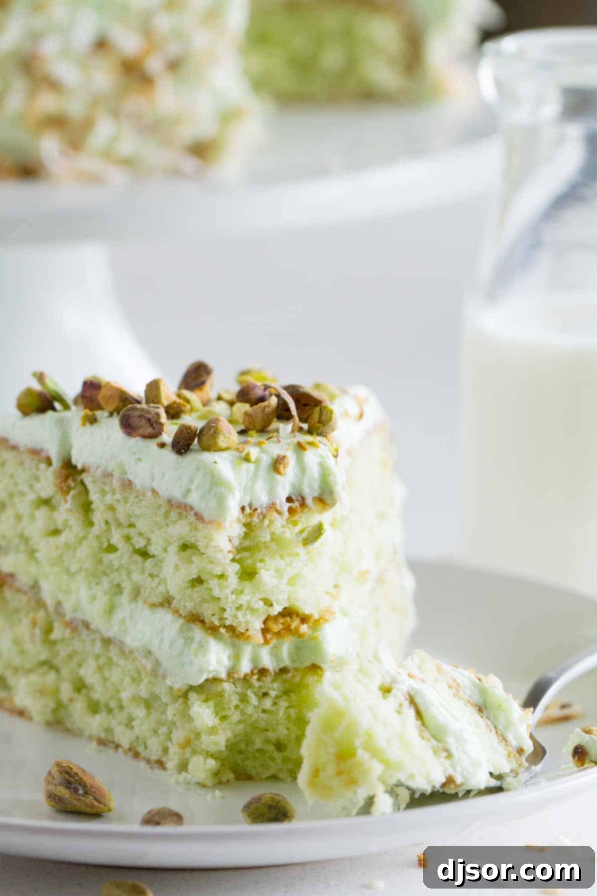 Pistachio Cake - aka Watergate Cake - with a bite taken from it.