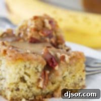 slice of banana coffee cake with honey glaze and pecans