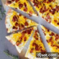 Spiralized Butternut Squash & Bacon Pizza 5 Bacon and Spiralized Butternut Squash Pizza cut into slices.