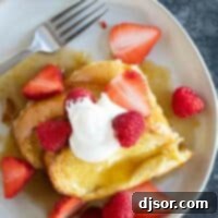 Golden Caramelized French Toast 3 Slices of Creme Brulee French Toast topped with fresh berries.