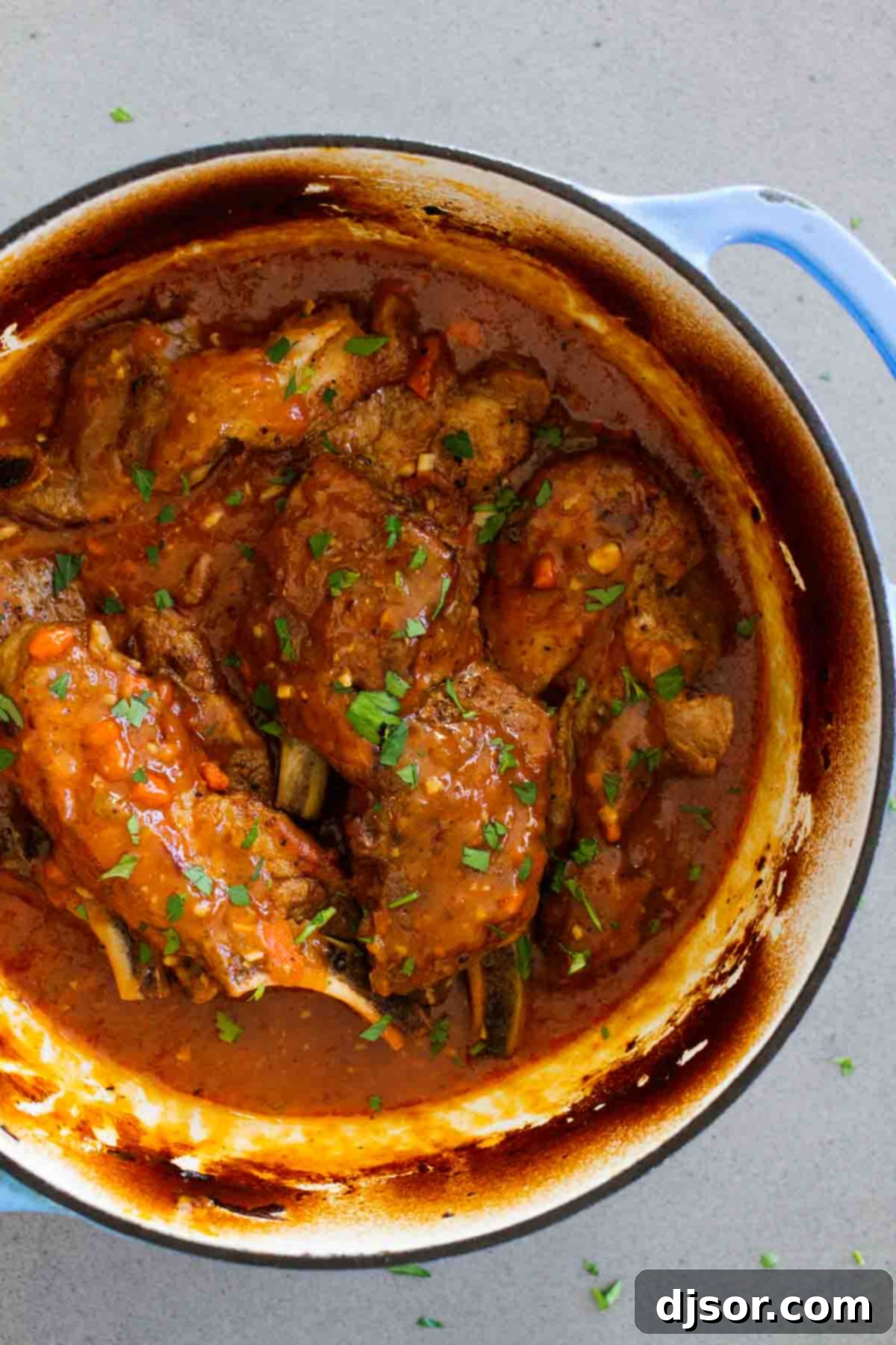 Succulent country style ribs braised to perfection in a Dutch oven.