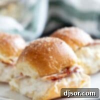 Three chicken bacon ranch sliders on a plate.